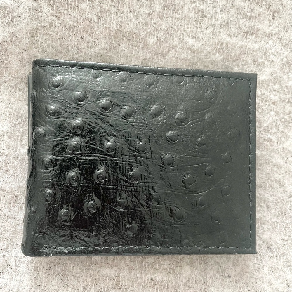NWT! Wallet genuine leather of ostrich style black color in the box. Umo Lorenzo